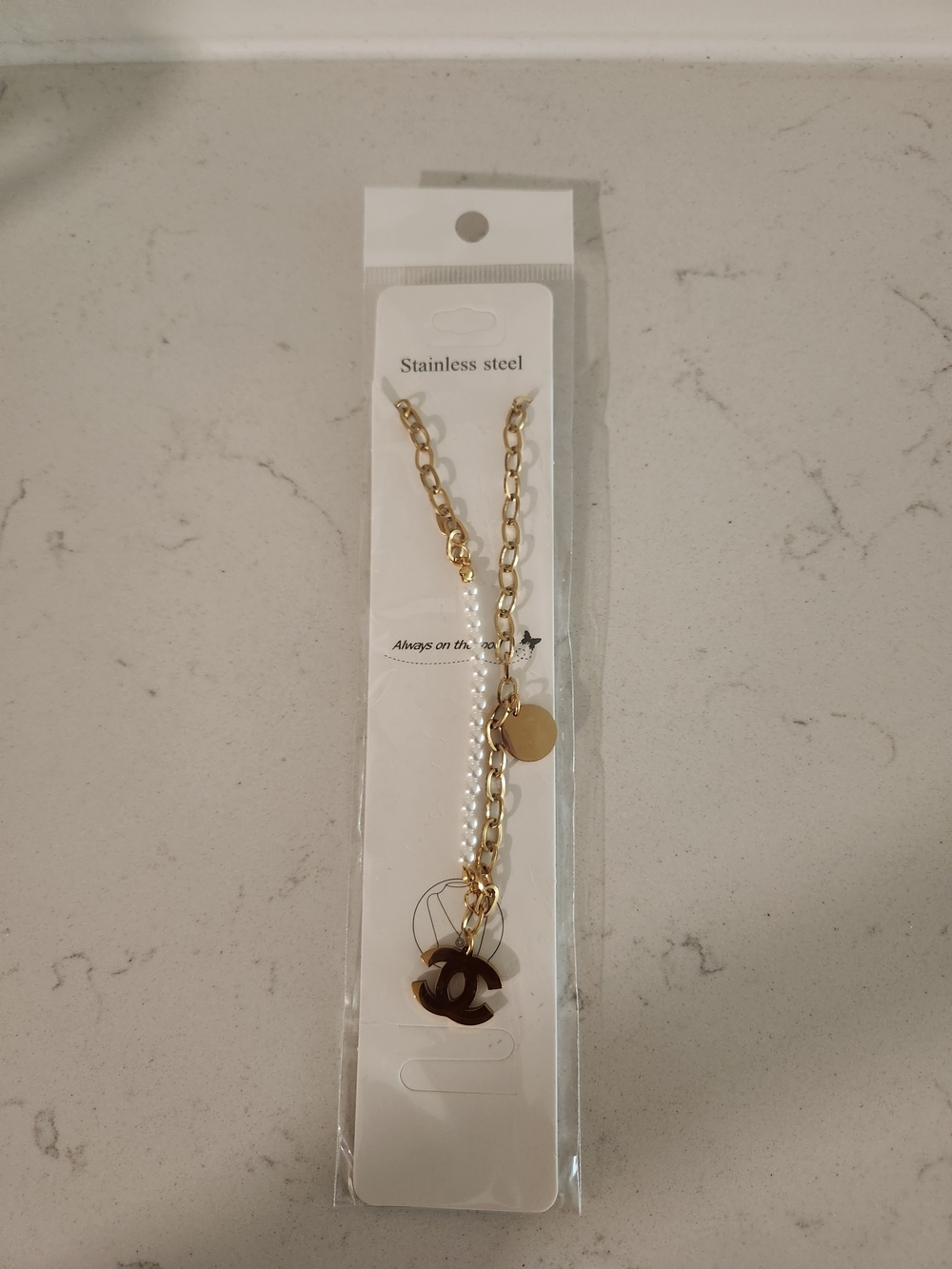 Gold Tone Link Bracelet with Pearl Accent and Pendant